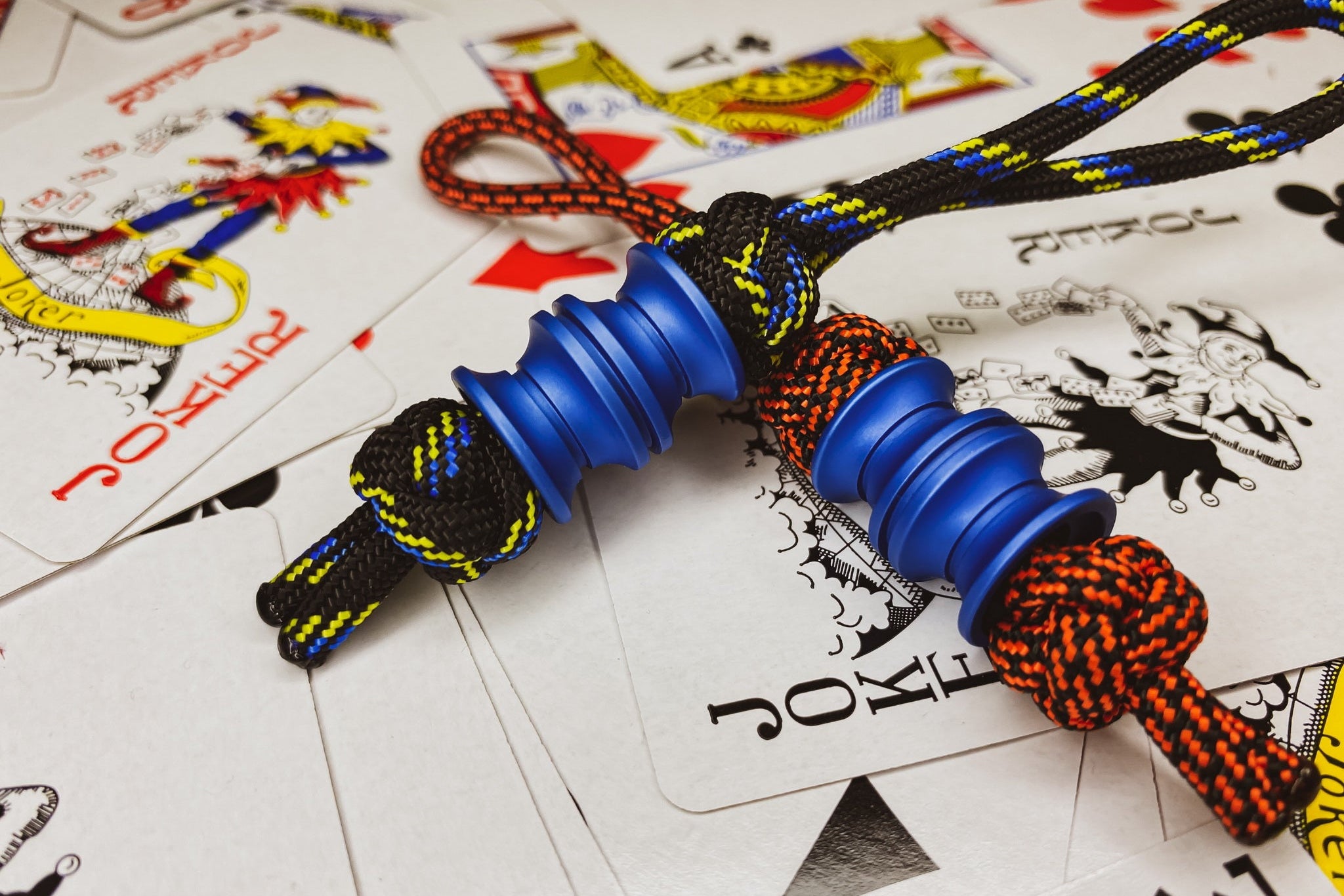 Professional matte blue lanyard bead for custom tools and gear setups.