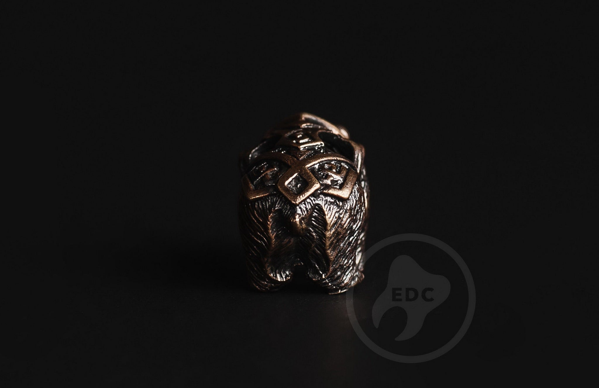 Showing the two 4mm holes for custom paracord weaving on the bear bead.-2