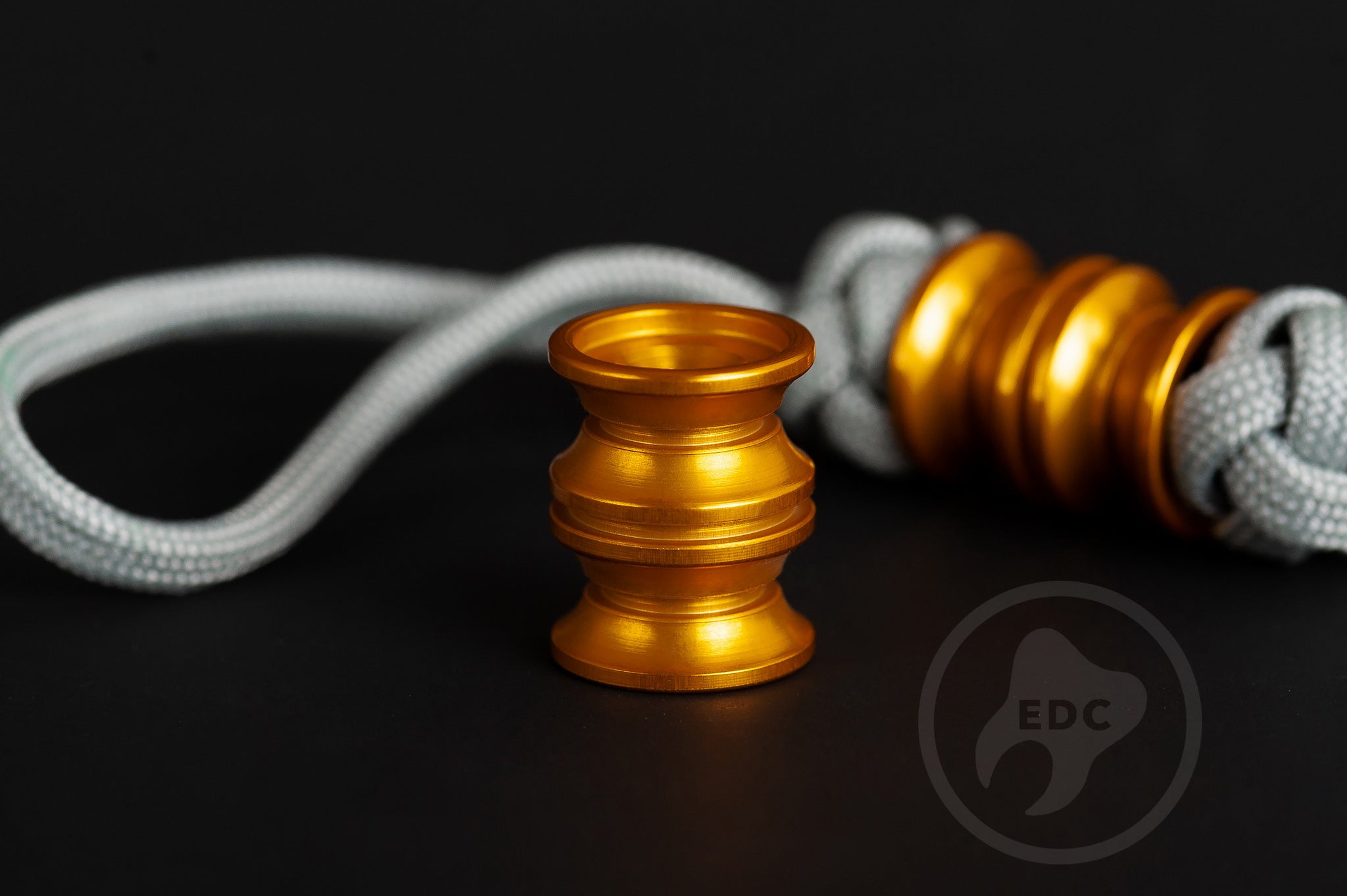 Orange Grooved Barrel bead with 6mm hole for 550 paracord lanyard.