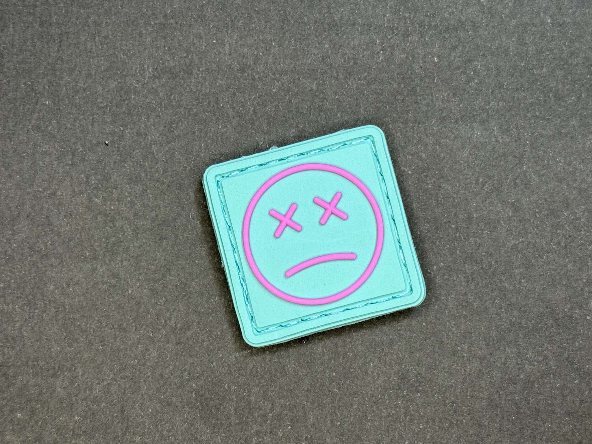 Sad Face Ranger Eye PVC Patch Cyan and Pink for EDC gear