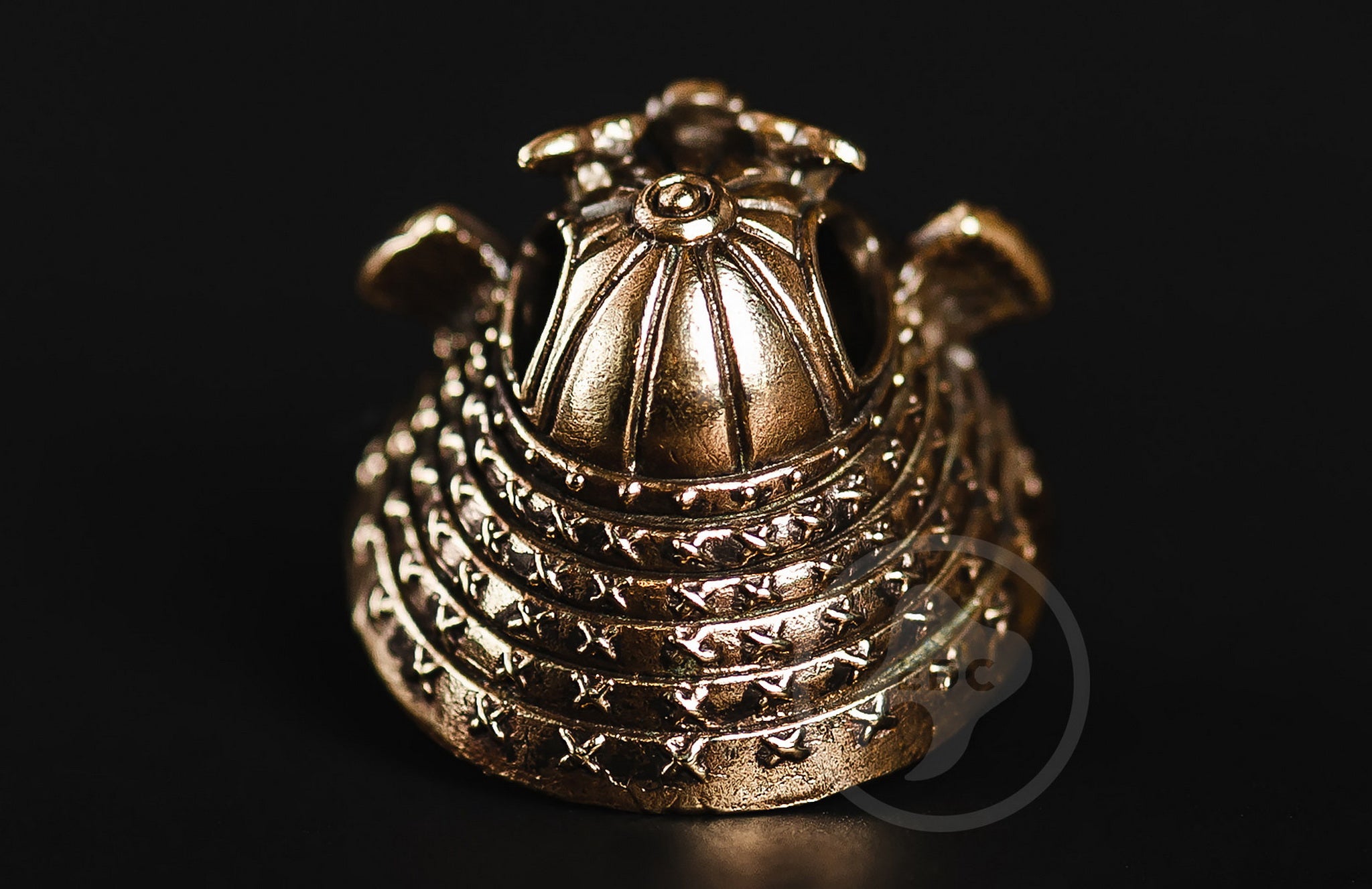 Close-up of the Menpo mask and Shikoro neck guard on the brass Samurai EDC bead.-1