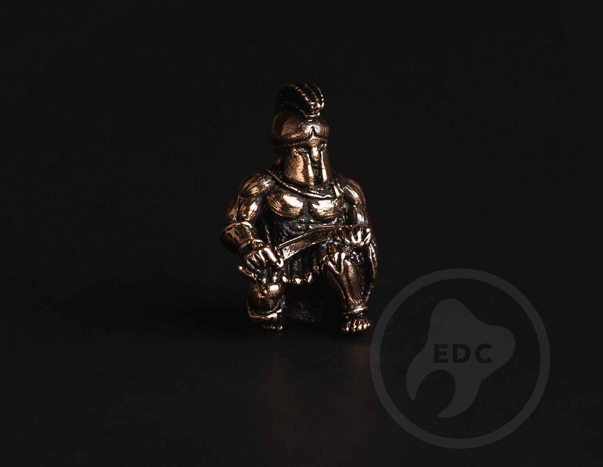 Ultra-lightweight Spartan warrior bead on a minimalist knife lanyard.