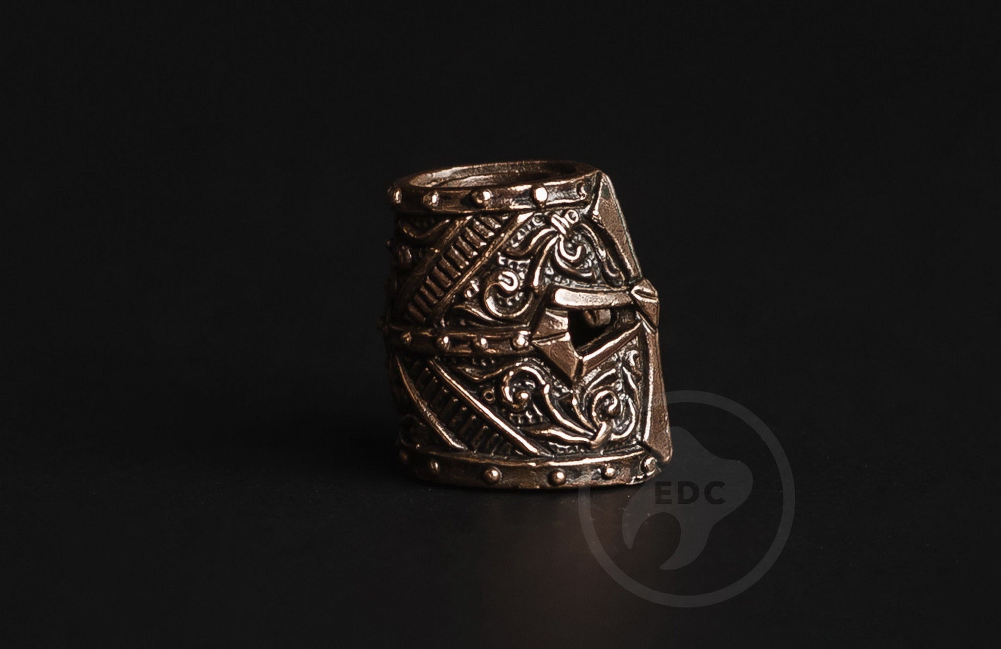 Close-up of the cruciform eye slits and rivets on the brass Crusader bead.-2