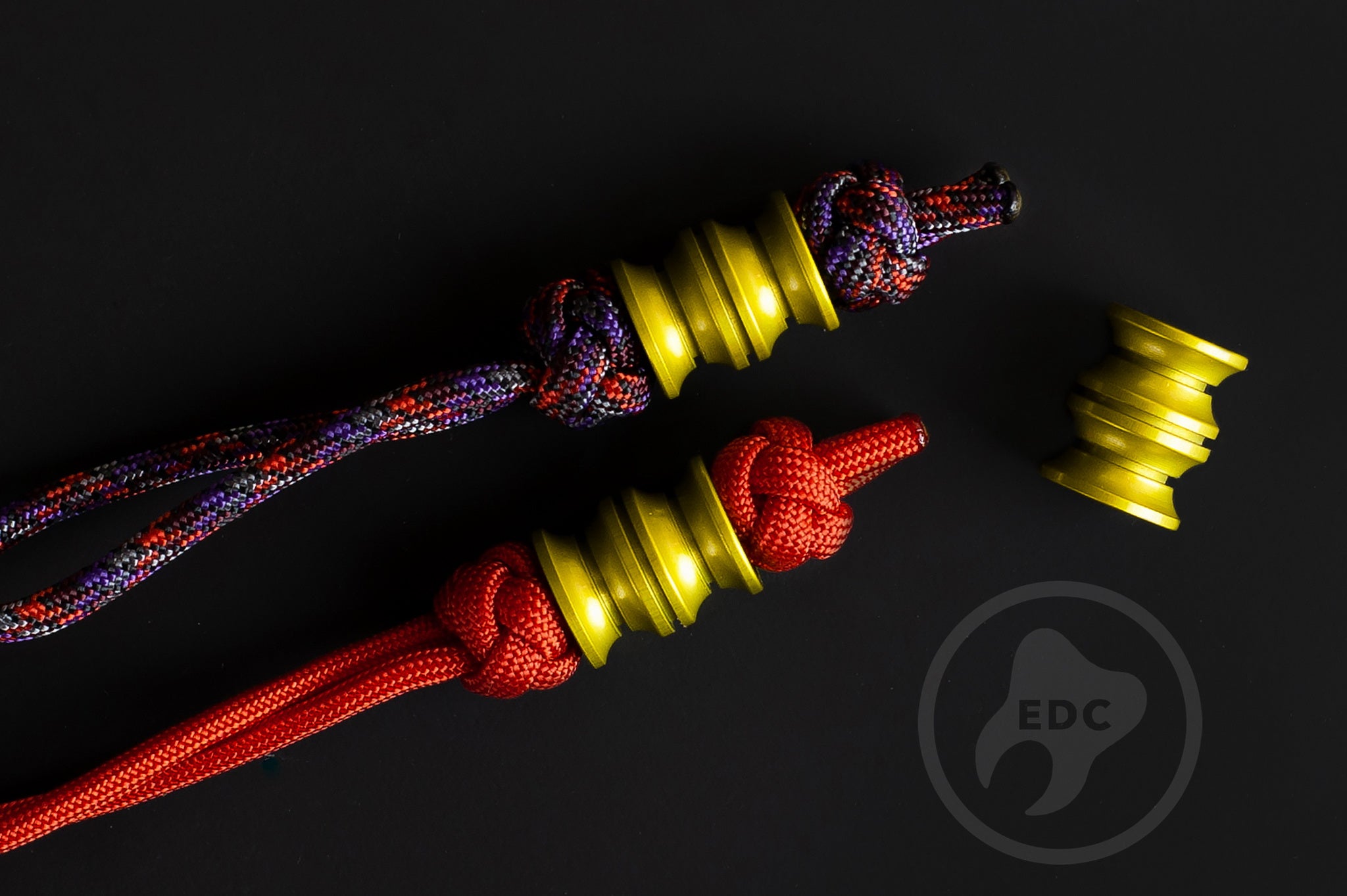 Macro shot of the ergonomic precision-milled grooves on a yellow metal bead.