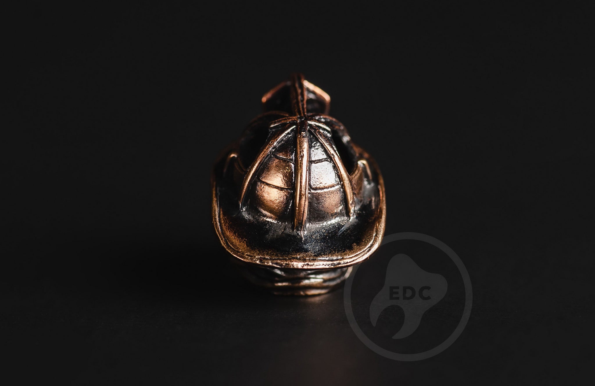Top view of the First Responder brass bead with a 4mm hole for paracord lanyards.-1