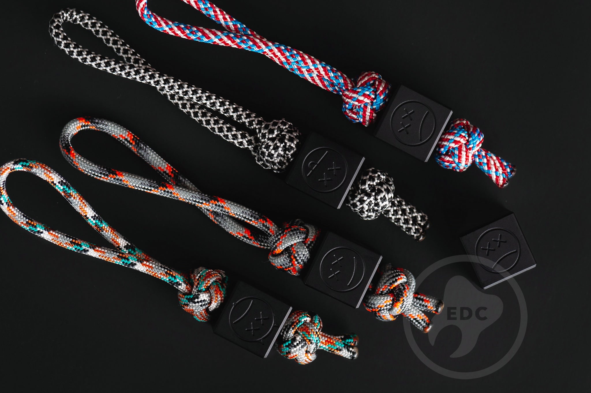 Black aluminum Sad Face Cube paracord bead.-1