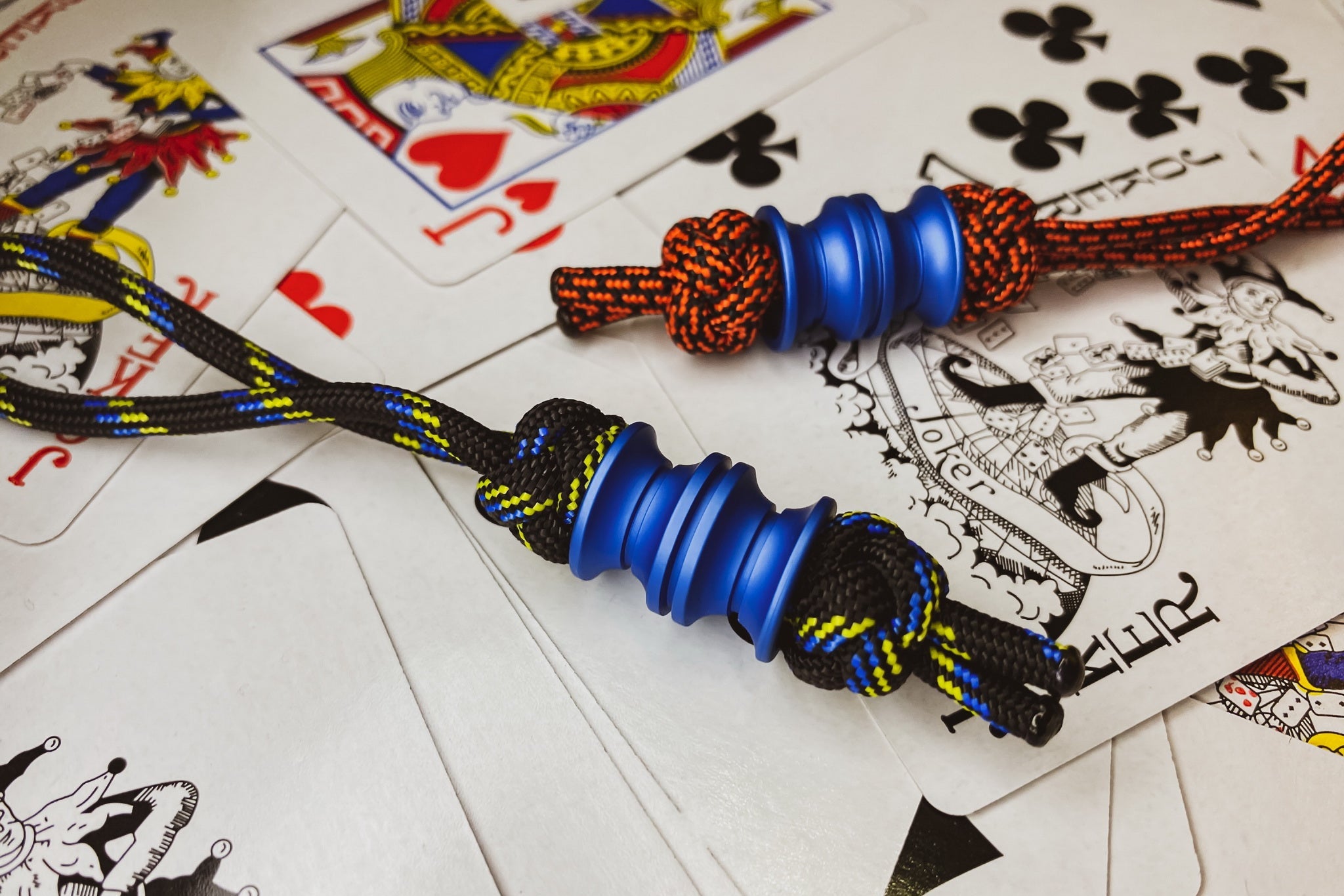 Blue Matte Grooved Barrel EDC bead showing the 6mm hole for 550 paracord attachment.