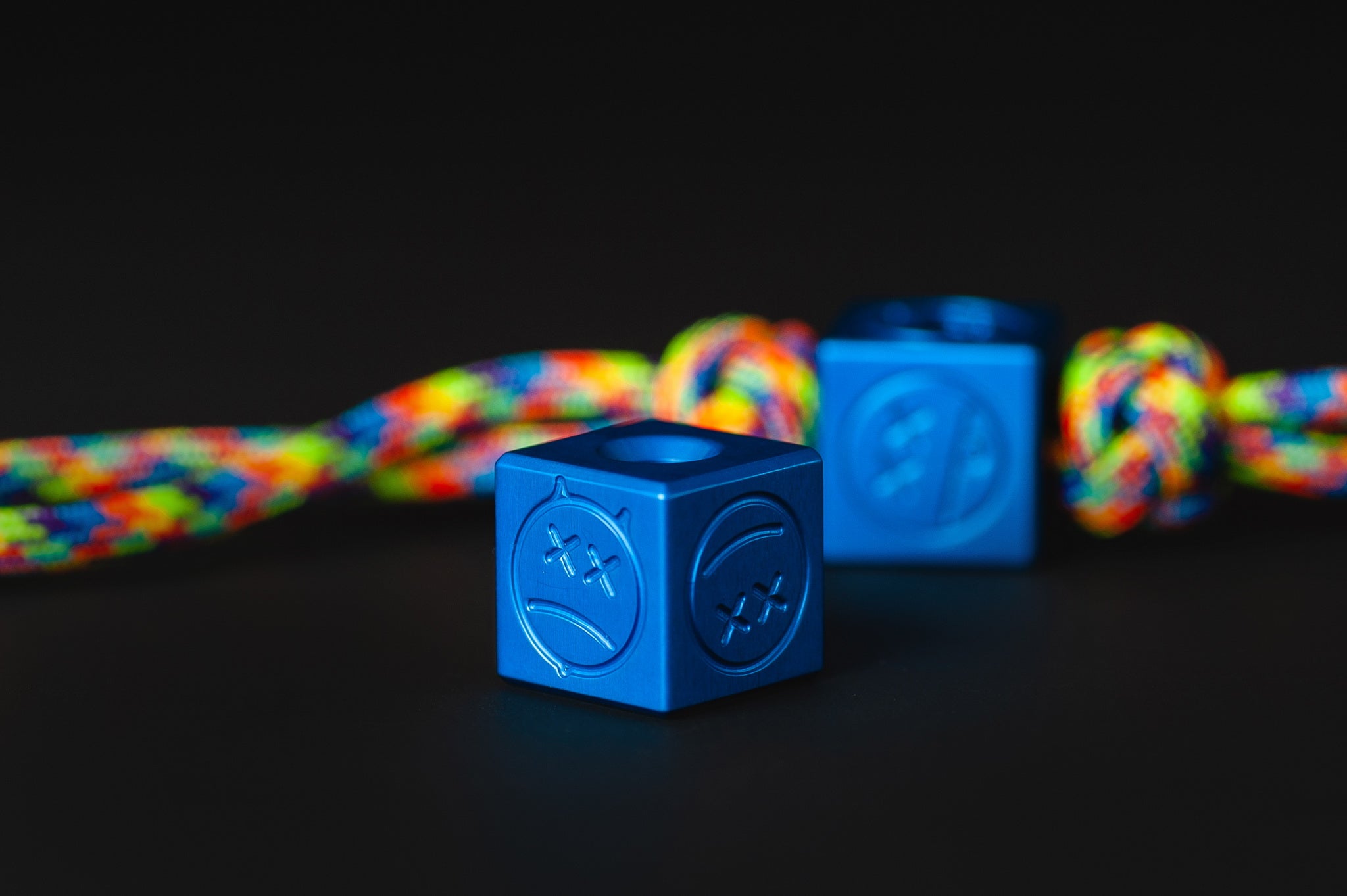 Close-up of the vibrant Type II blue anodized texture on a metal bead.-1