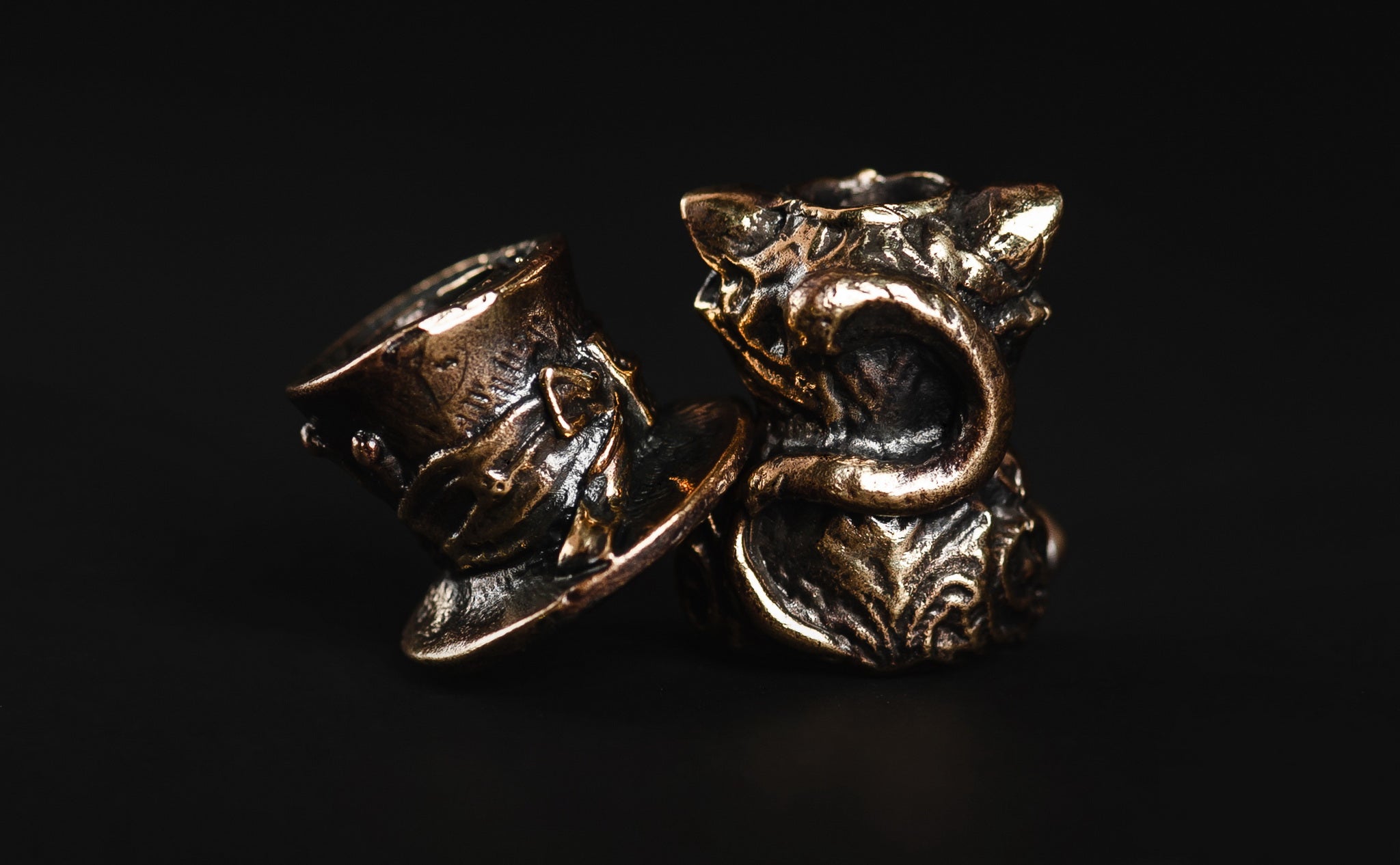 XL Cheshire Cat brass bead acting as a counterweight on a large knife lanyard.-1