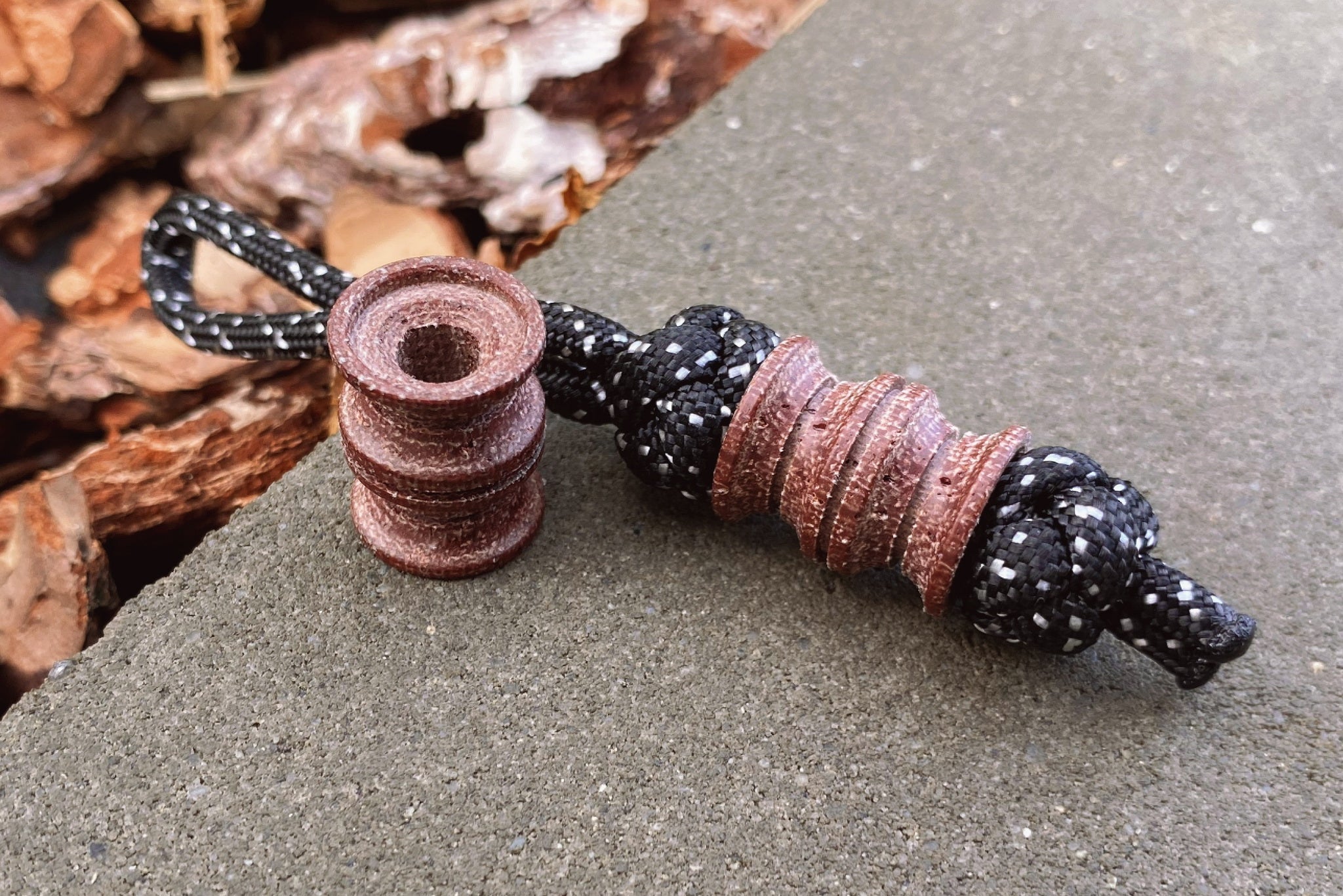 Close-up of the organic texture on a Brown Micarta EDC bead.