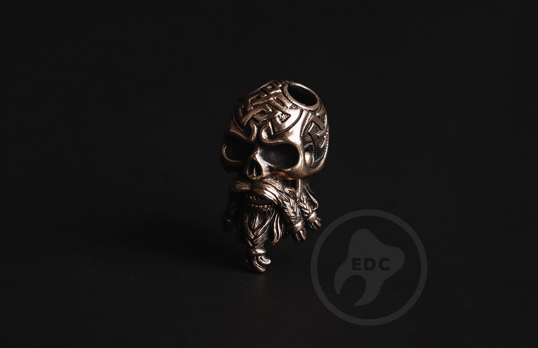 Close-up of the intricate Celtic knot pattern on the brass skull.-1