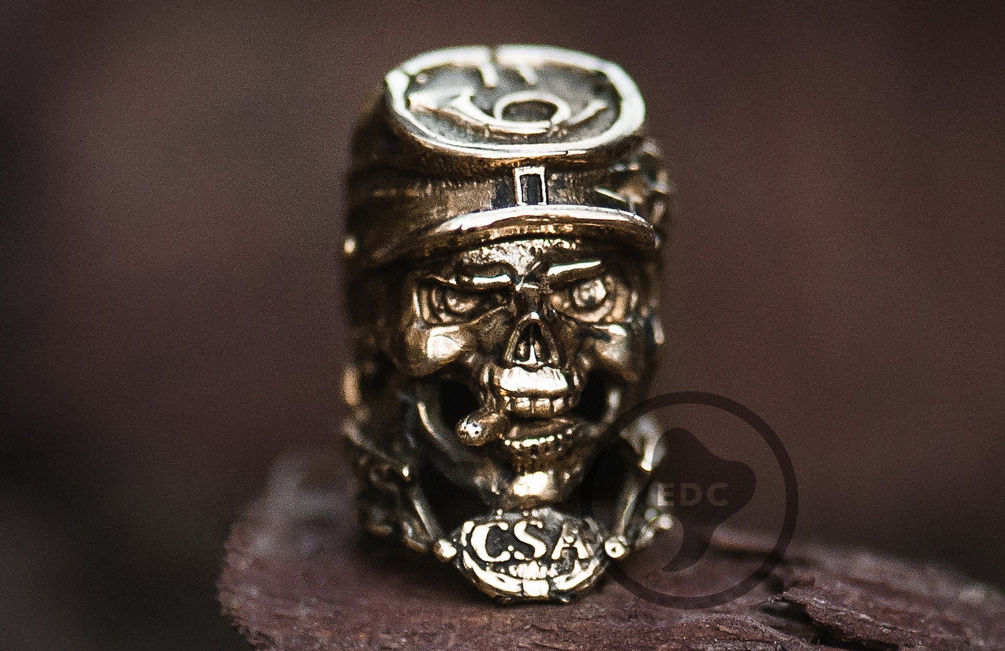 Profile of the historical infantry skull bead with antique blackened finish.