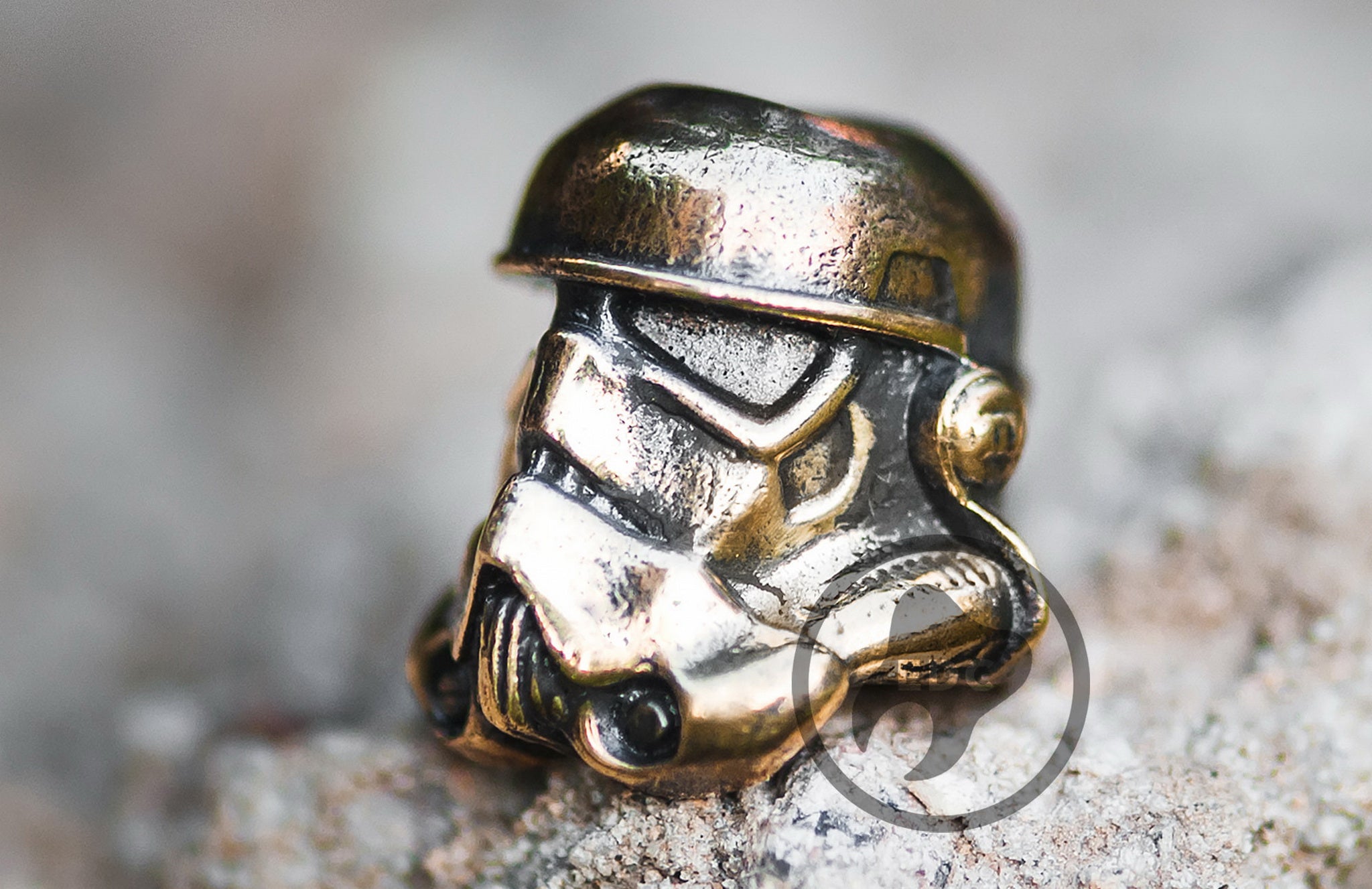 High-contrast blackened finish on the iconic visor of the brass soldier helmet bead.-1