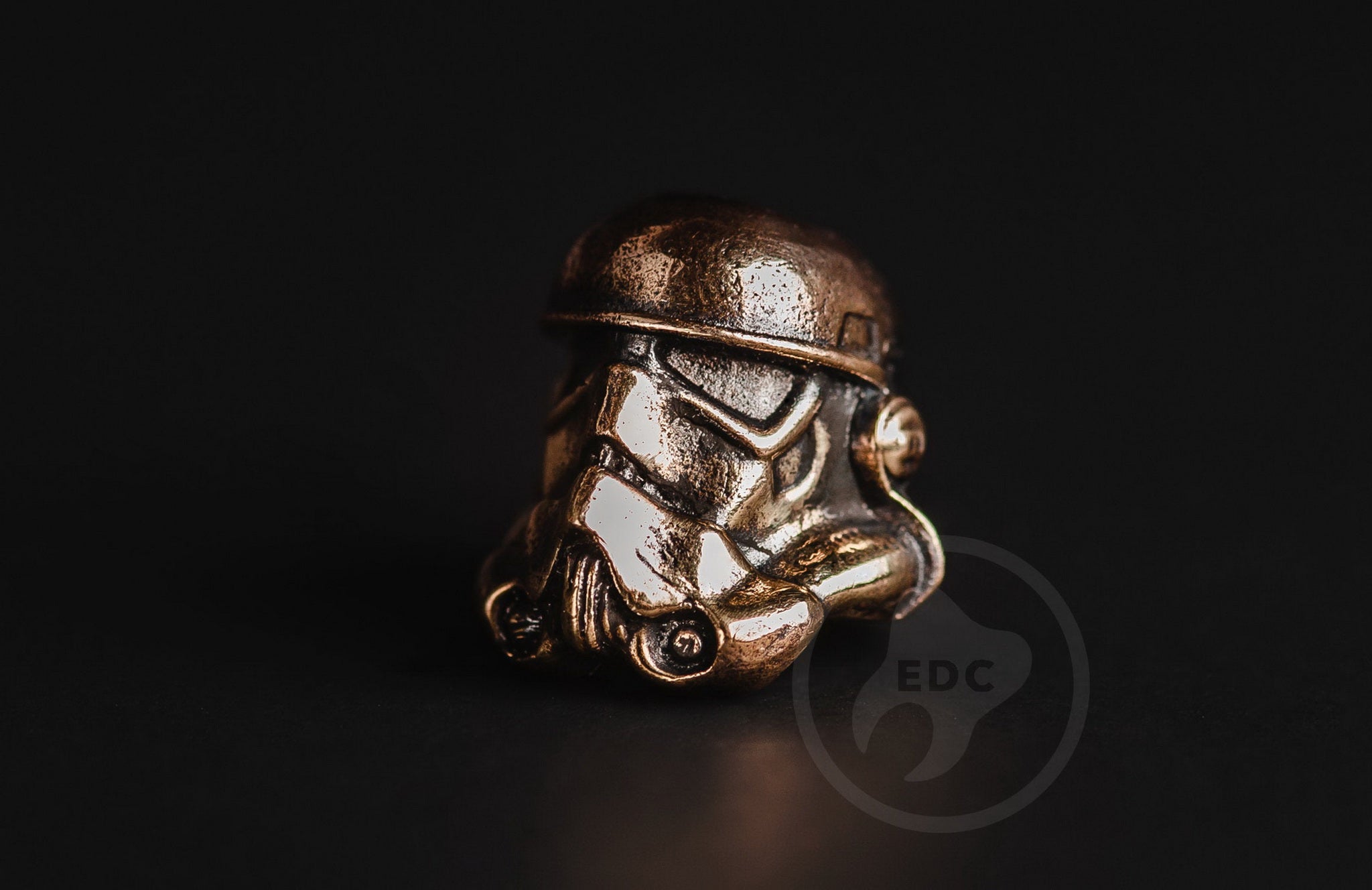 Hand-casted brass lanyard bead in the shape of an Imperial Galactic Soldier helmet.-2