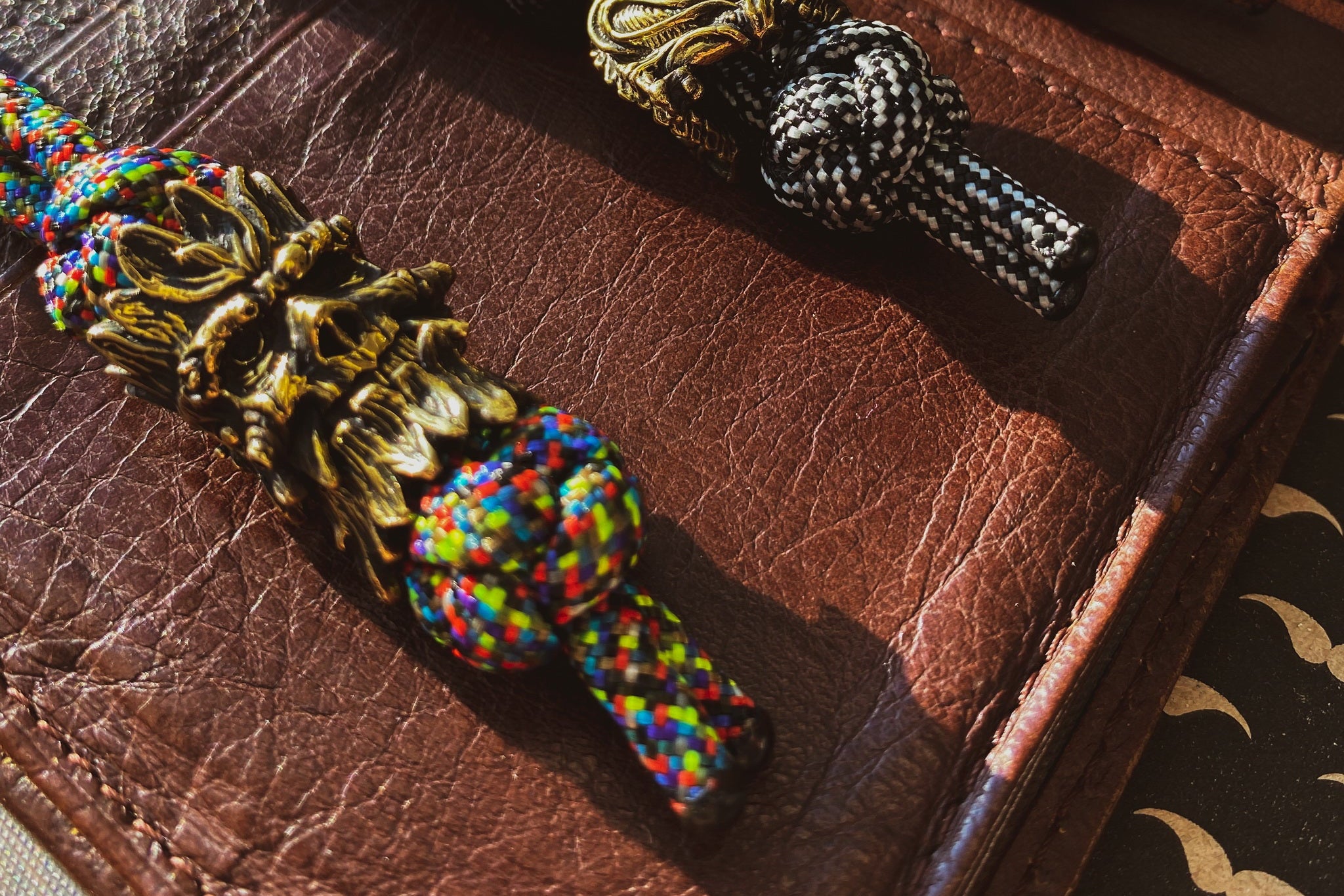 Close-up of the wood-like texture on the brass Leshy spirit bead.