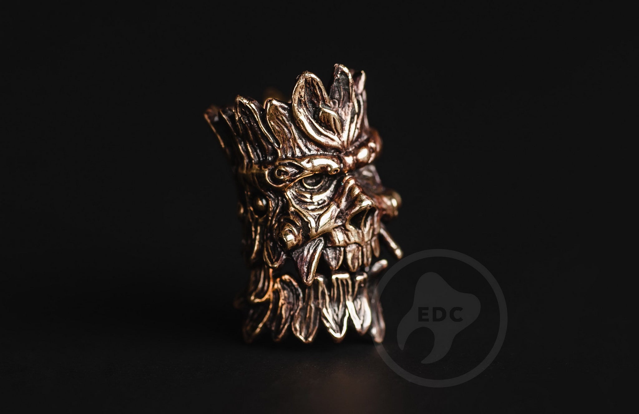 Profile view of the bearded forest spirit bead with antique blackened finish.-1