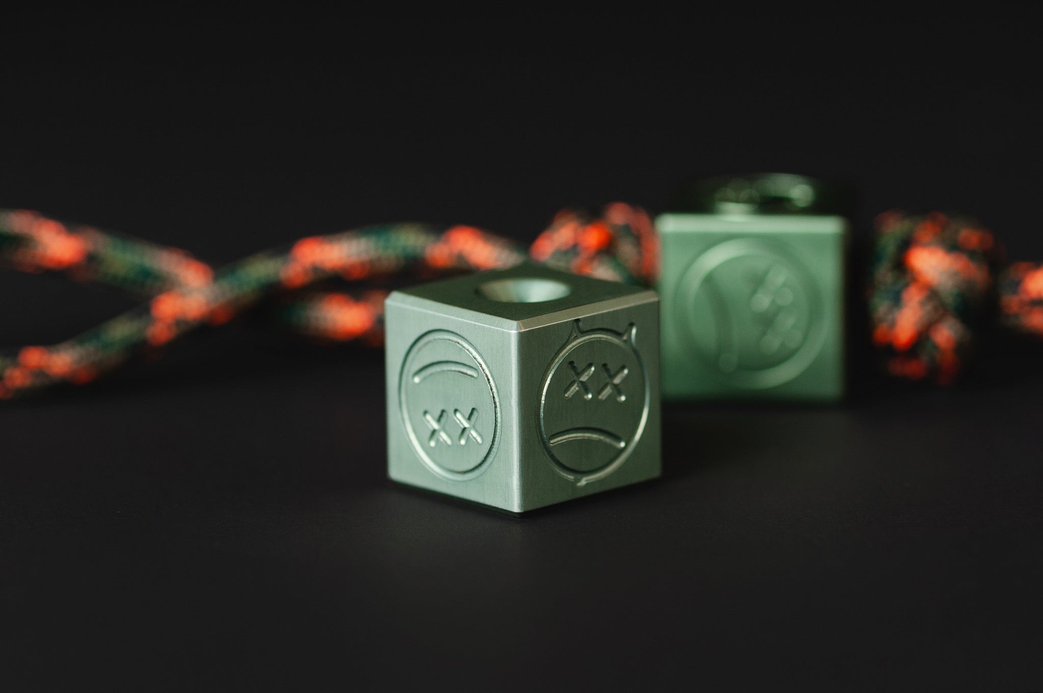 Olive green Type II anodized aluminum Sad Face Cube bead.