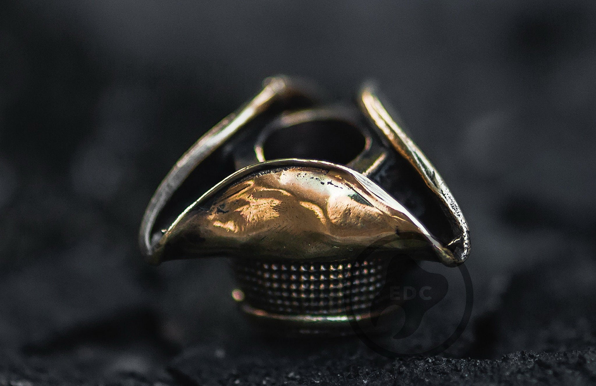 Medieval Plague Doctor brass bead on a black leather knife lanyard.