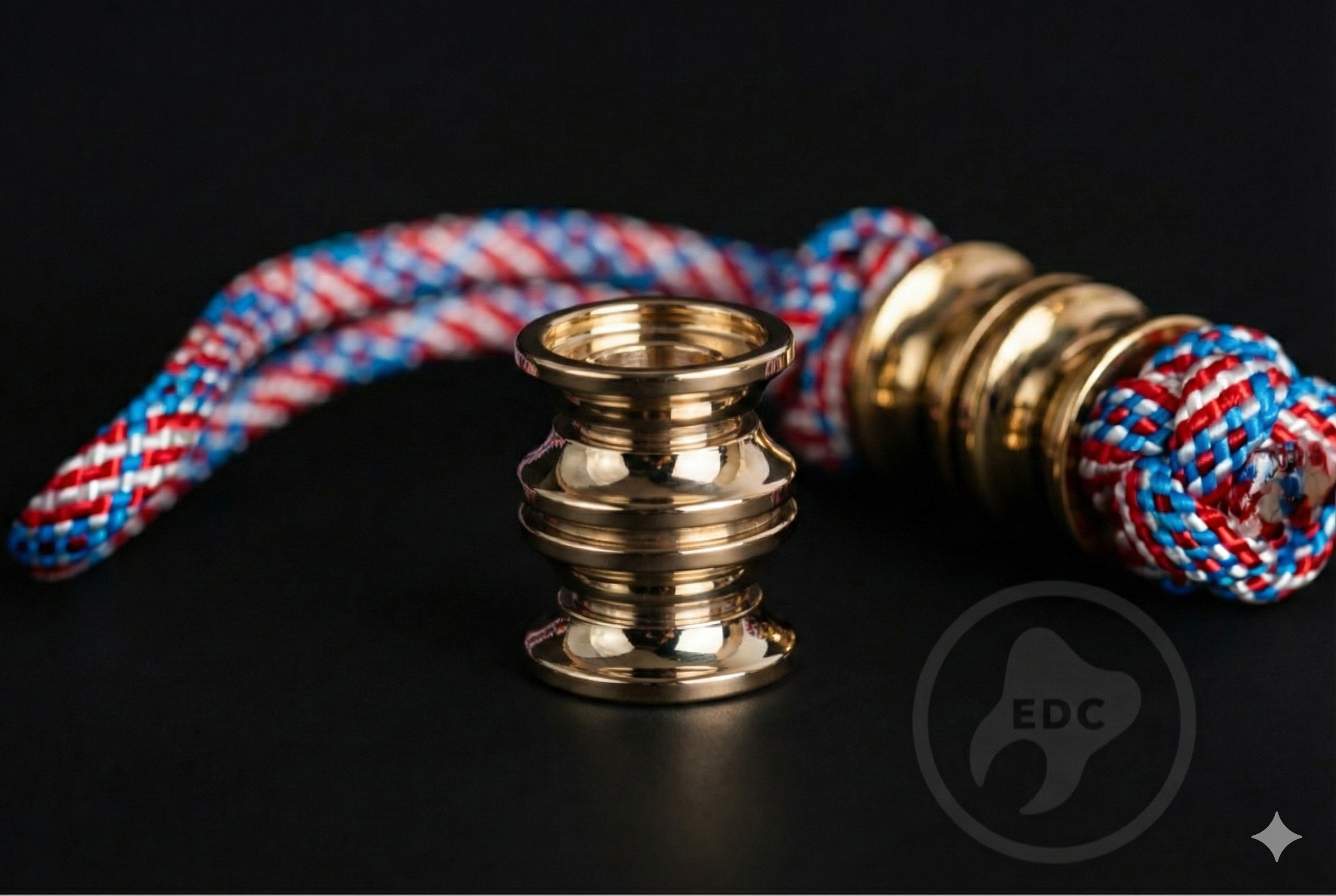 Classic brass barrel bead with 6mm hole on a knife lanyard.