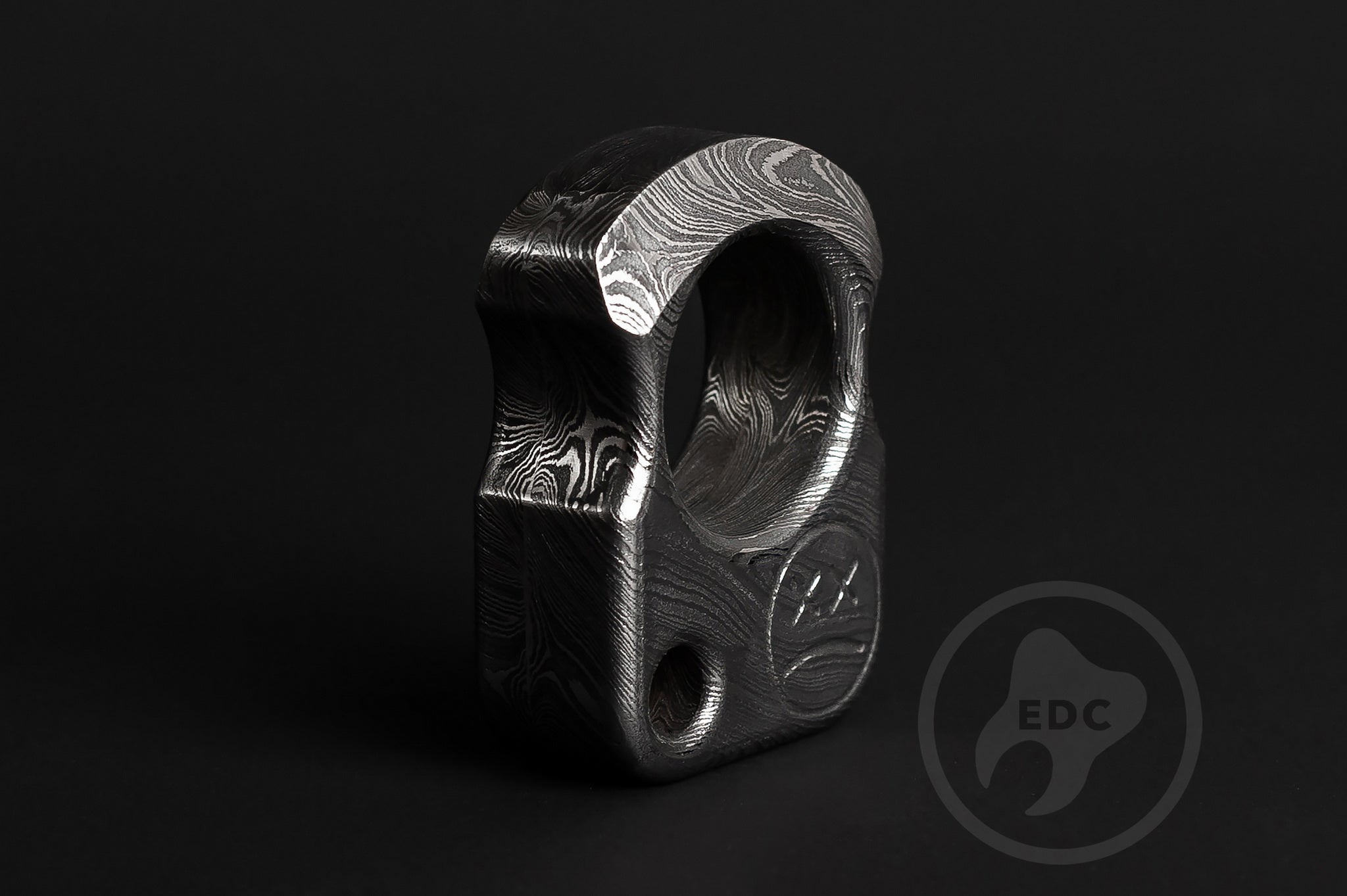Close up of high-contrast forged damascus steel texture on S01 model