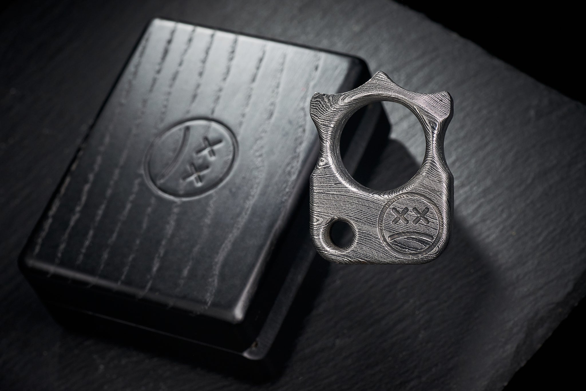 Premium black oak and alcantara packaging for elite damascus accessories