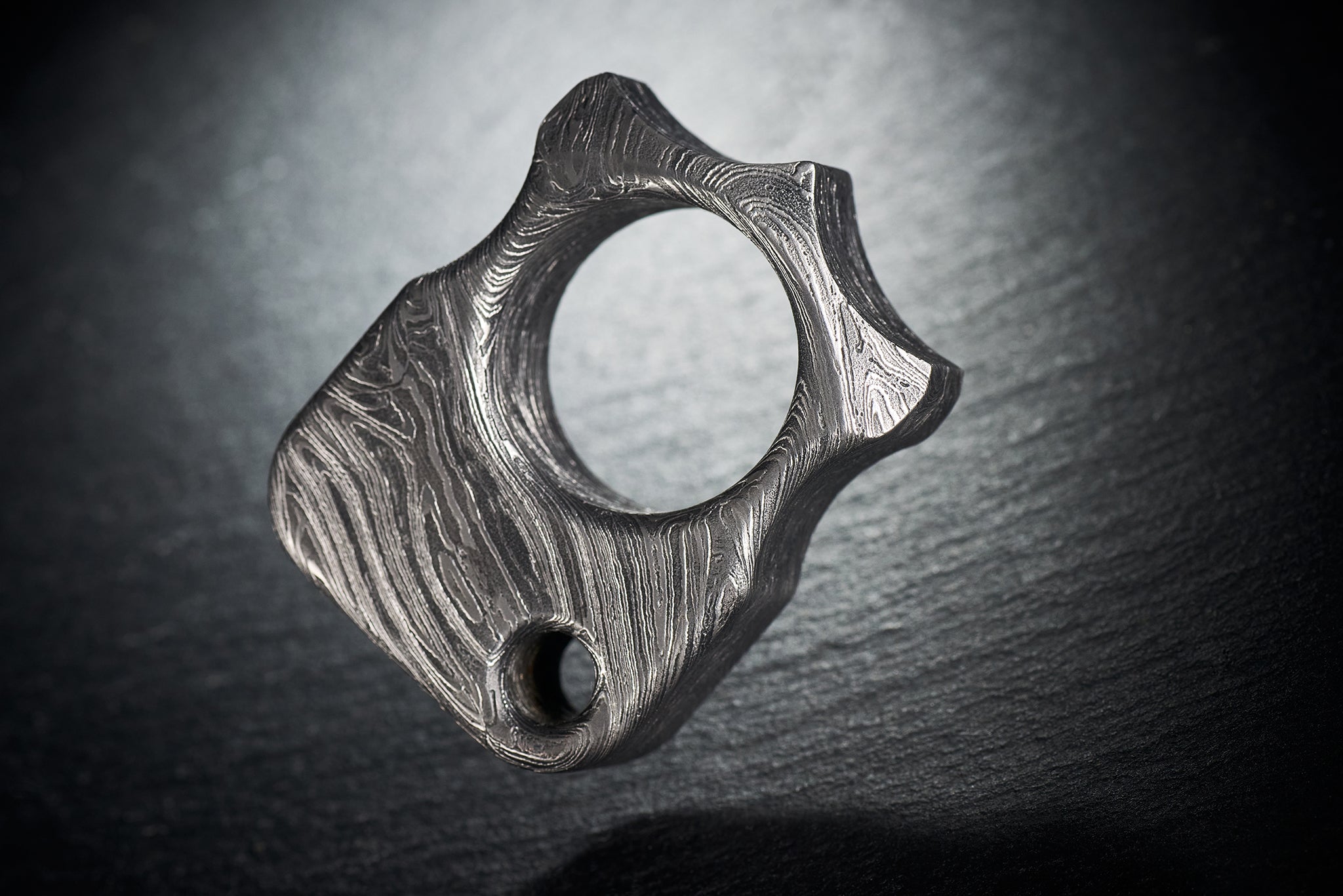 Side view of 140g heavyweight Damascus steel EDC sculpture-2