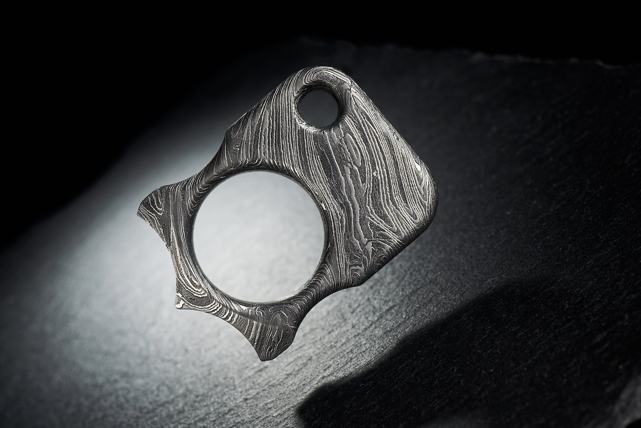 Side view of 140g heavyweight Damascus steel EDC sculpture-1