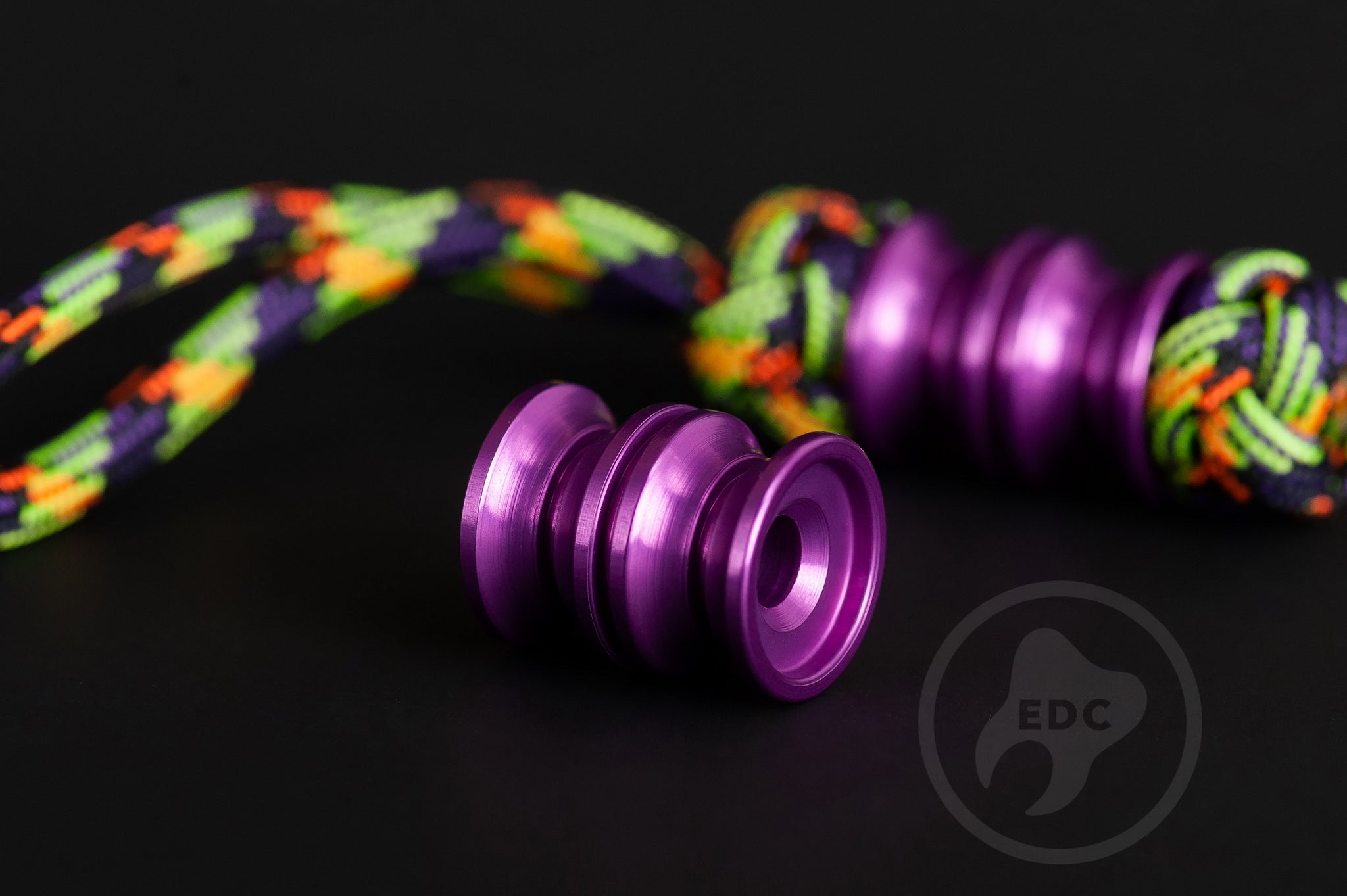 Purple anodized aluminum Grooved Barrel lanyard bead.