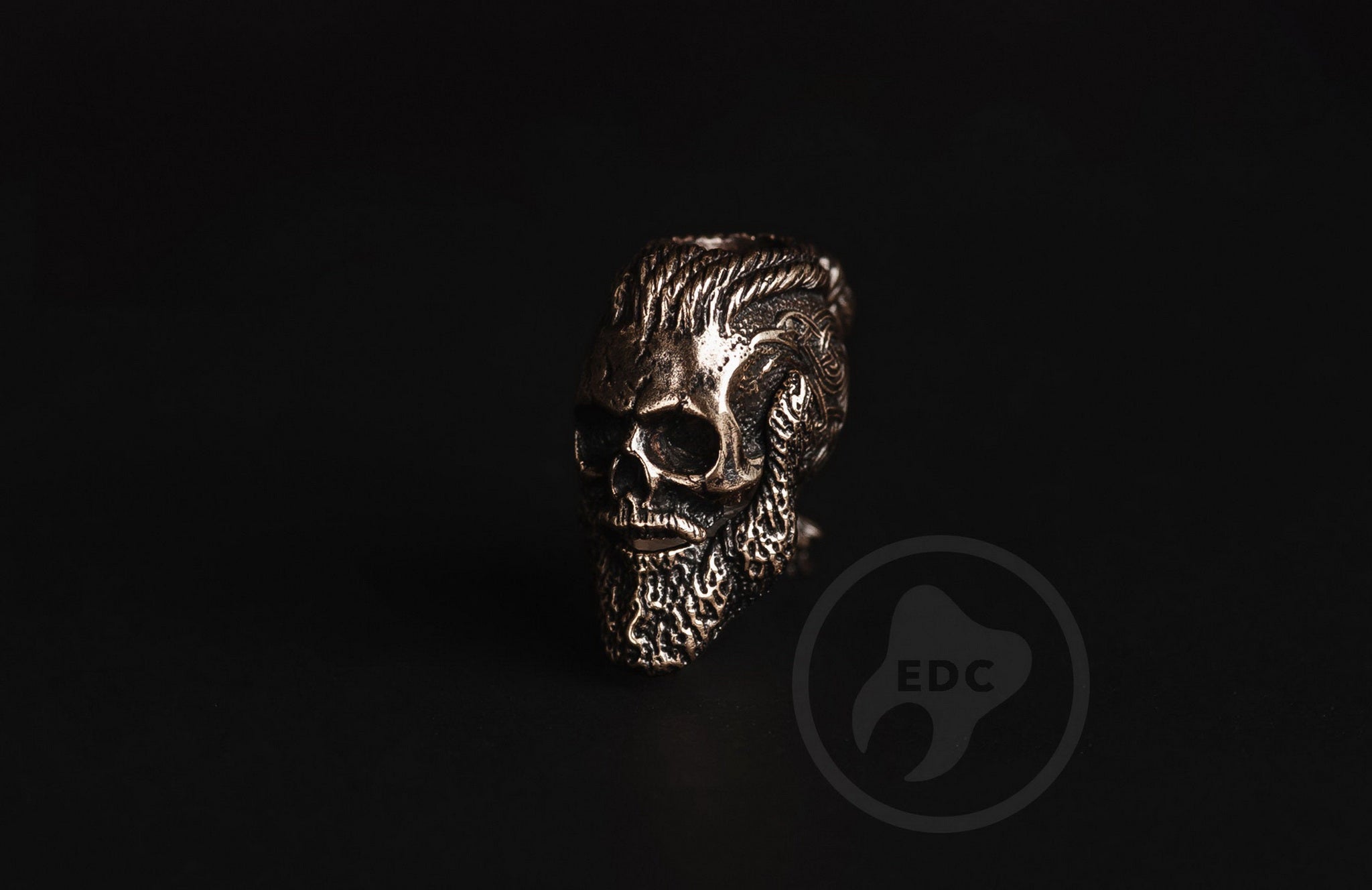Profile view of the bearded Viking skull bead showing the slim ergonomic design.