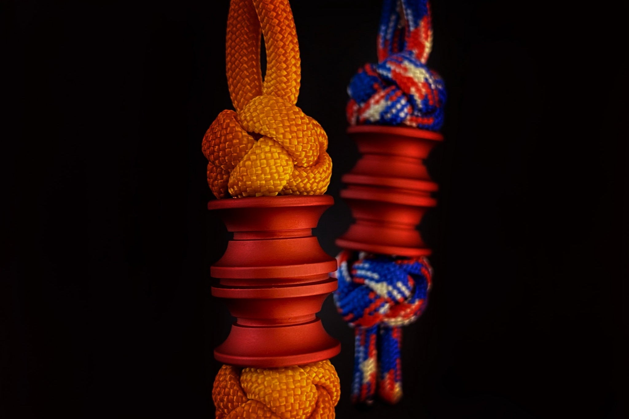 Red matte anodized aluminum Grooved Barrel knife lanyard bead.