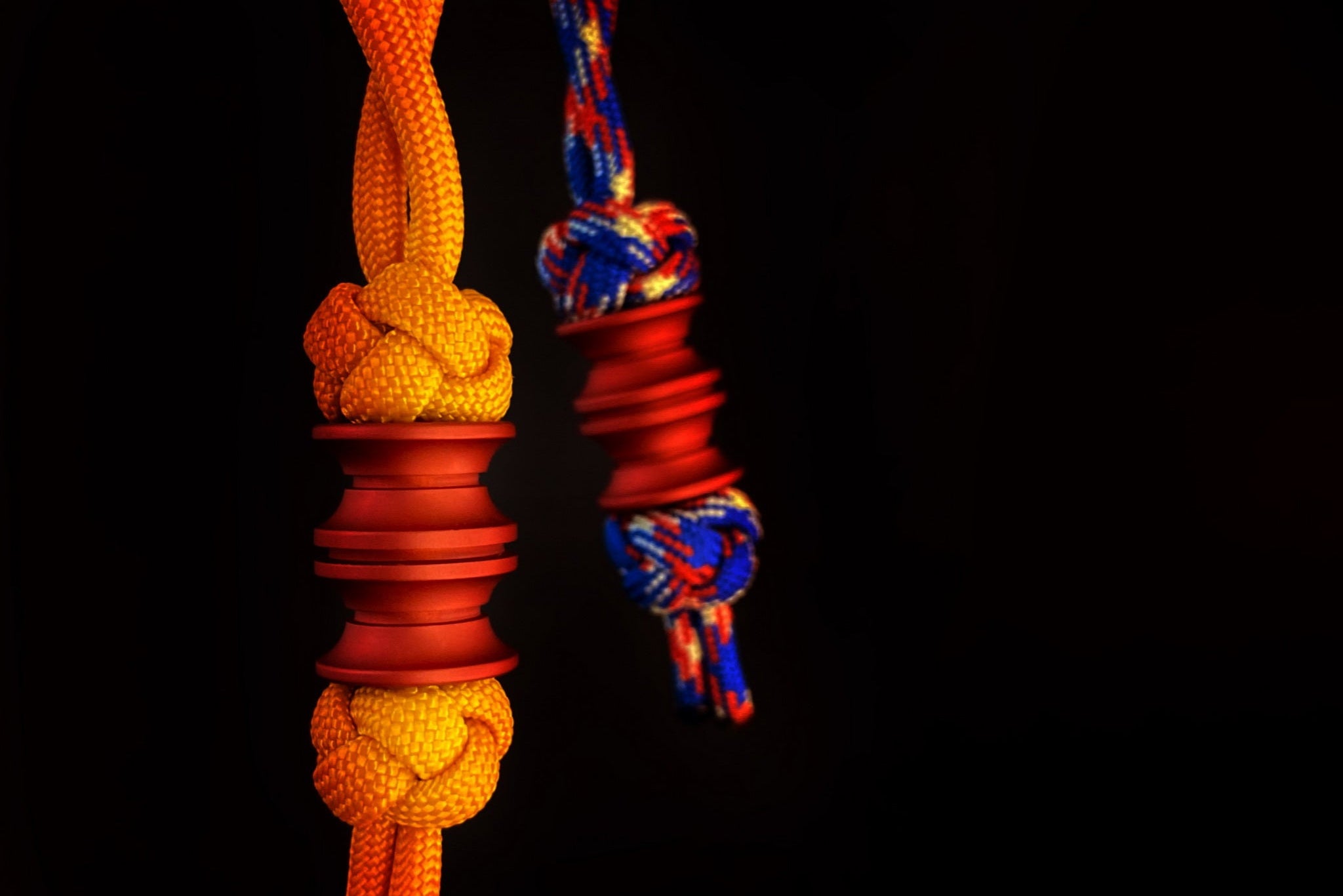 Red Grooved Barrel EDC bead showing the 6mm hole for 550 paracord attachment.-1