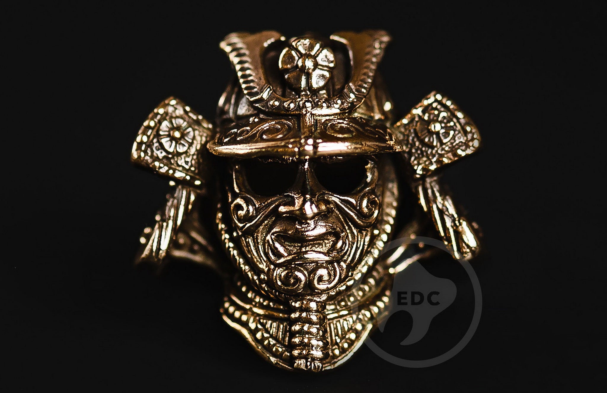 Hand-casted brass lanyard bead shaped like a traditional Japanese Samurai Kabuto helmet.-1