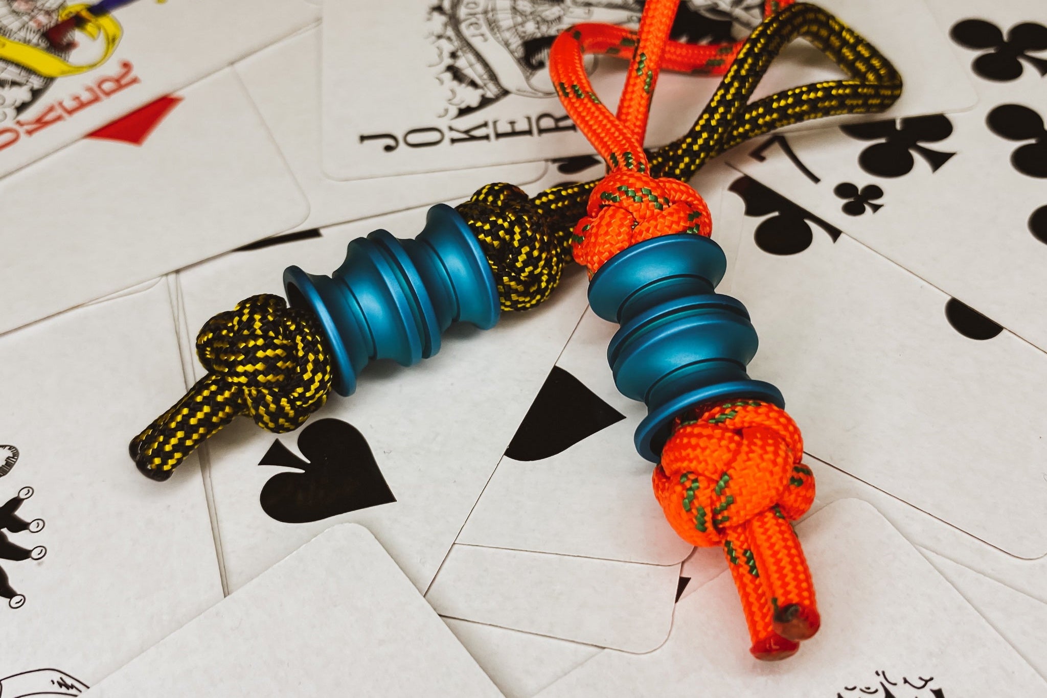 Teal matte anodized aluminum Grooved Barrel knife lanyard bead.