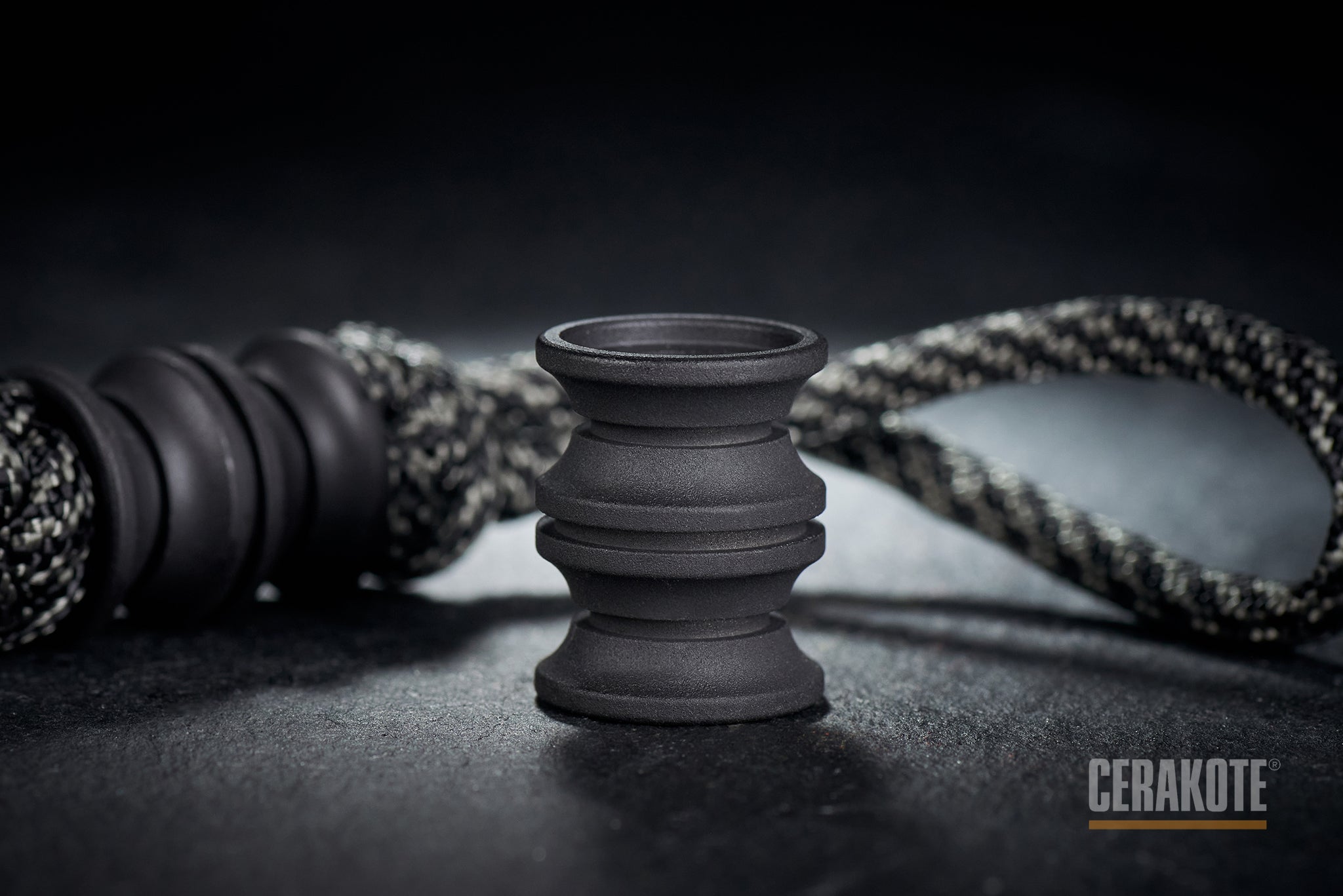 Ribbed texture of Armor Black Cerakote on a titanium barrel bead.