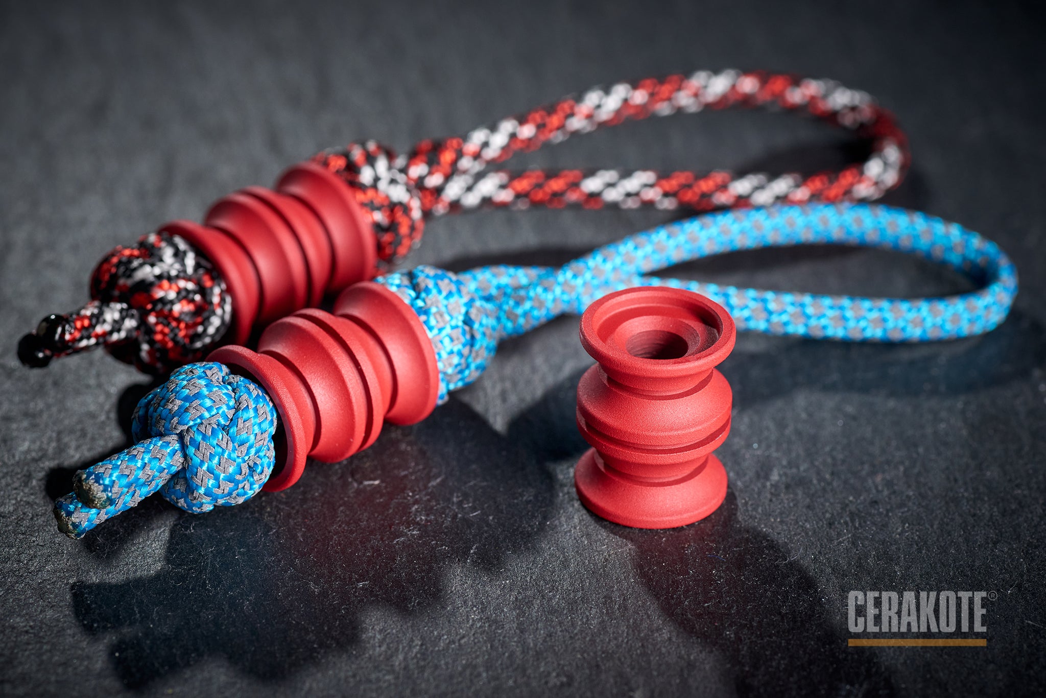 Ribbed texture of H-306 Red Cerakote on a titanium bead.-1