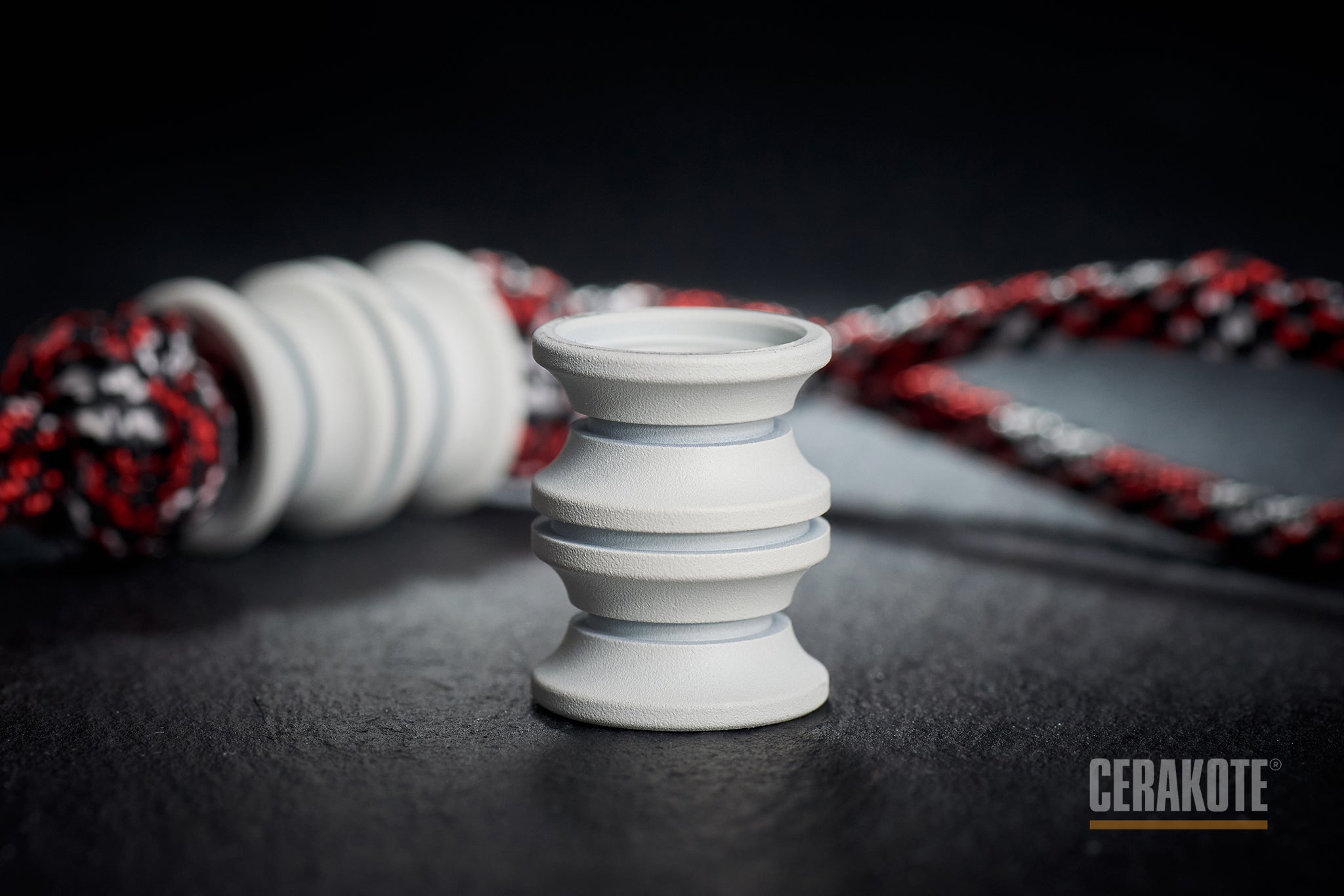 Matte Snow White Cerakote finish on a titanium barrel bead.