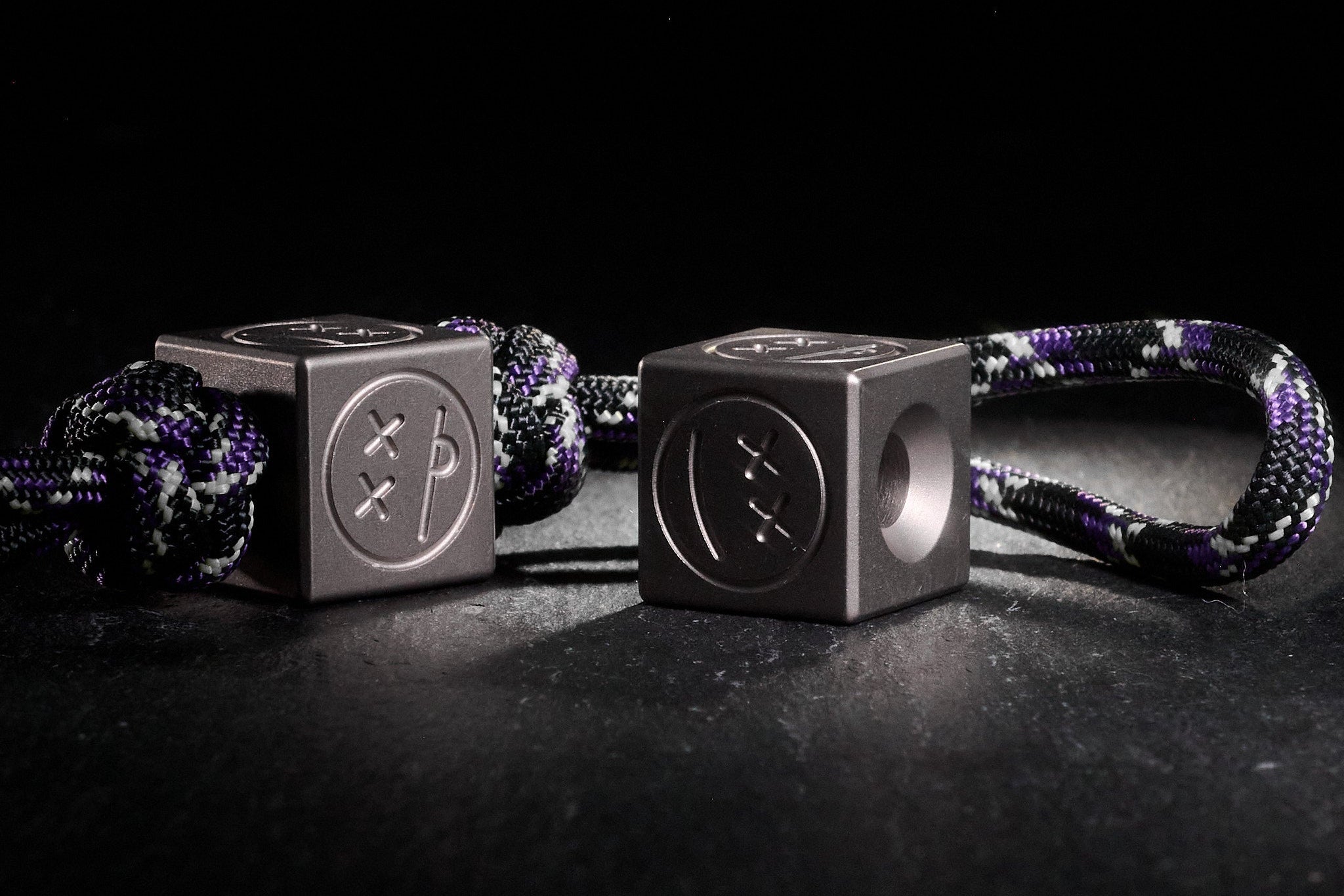 Sandblasted Titanium Sad Face Cube bead for knife lanyards.-2