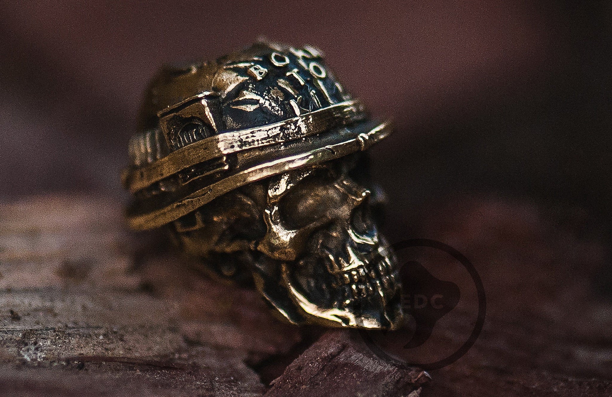 Hand-casted brass lanyard bead featuring a skull in a Vietnam War M1 helmet with "Born To Kill" text.-2